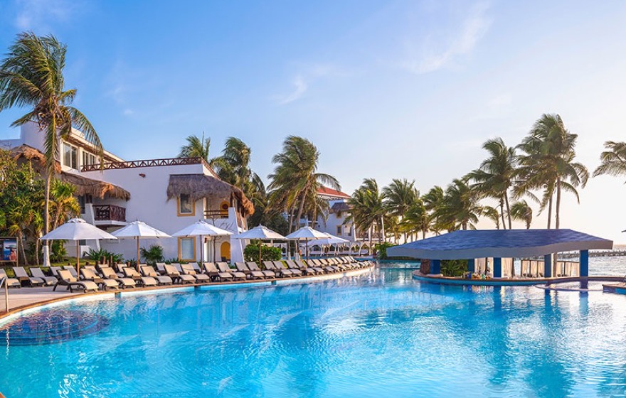 Oceanfront suites and infinity pool at Desire Riviera Maya Pearl Resort