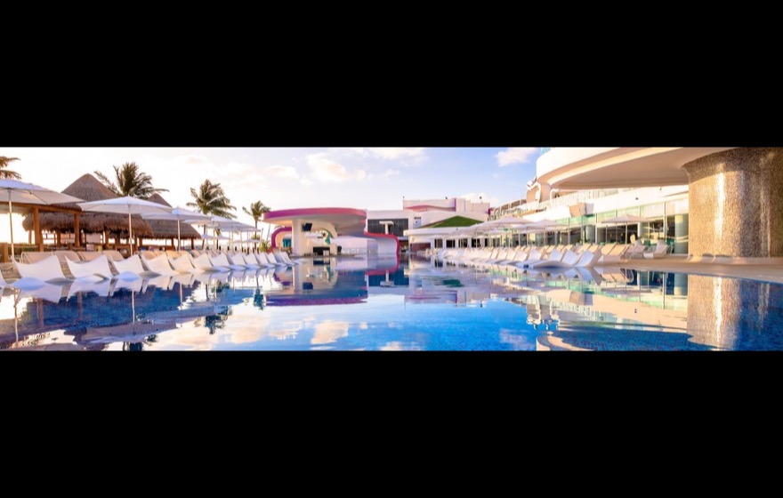 Playground pool and lounge beds at Temptation Cancun Resort